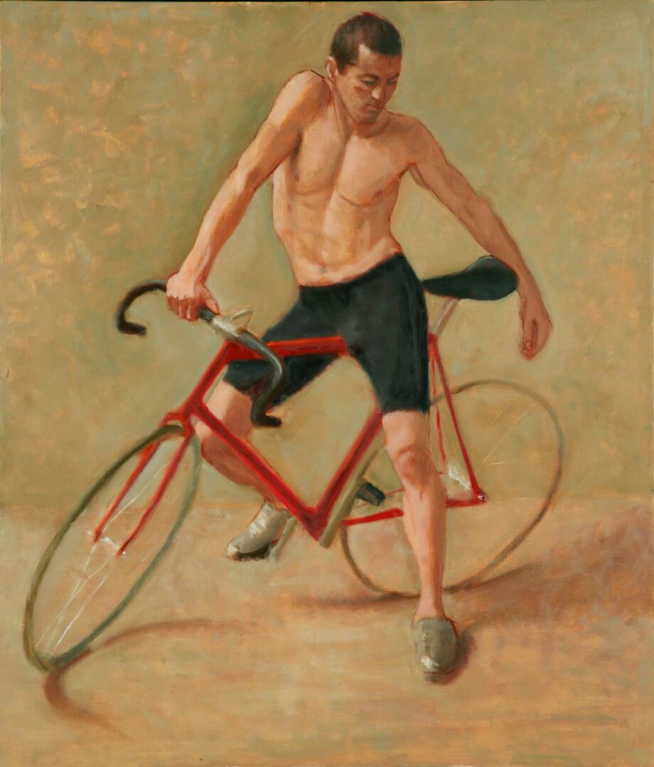 Man posing with red bicycle