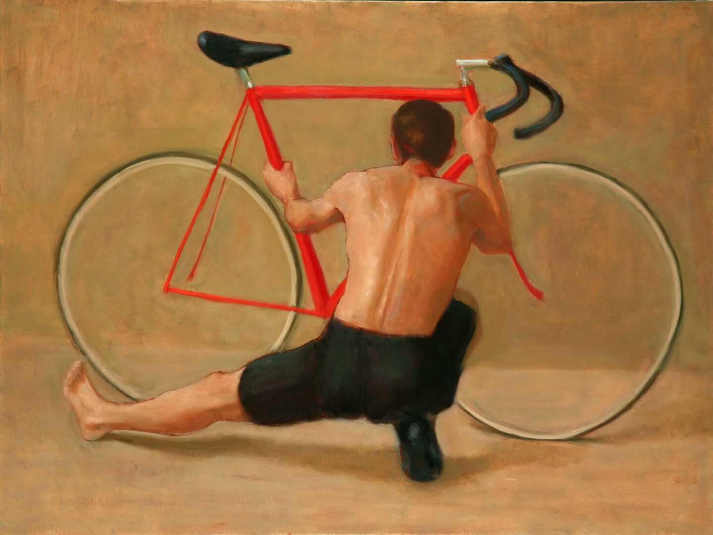 Shirtless man holding red bicycle
