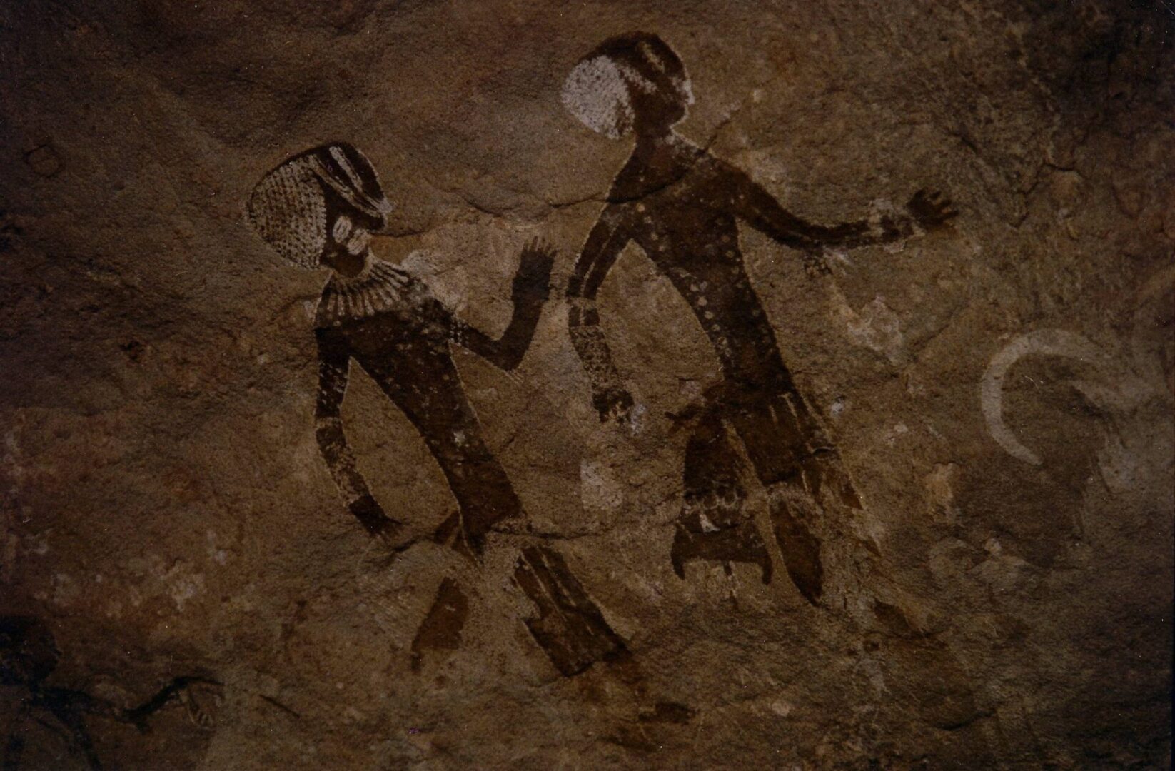 Prehistoric artwork showing two human figures